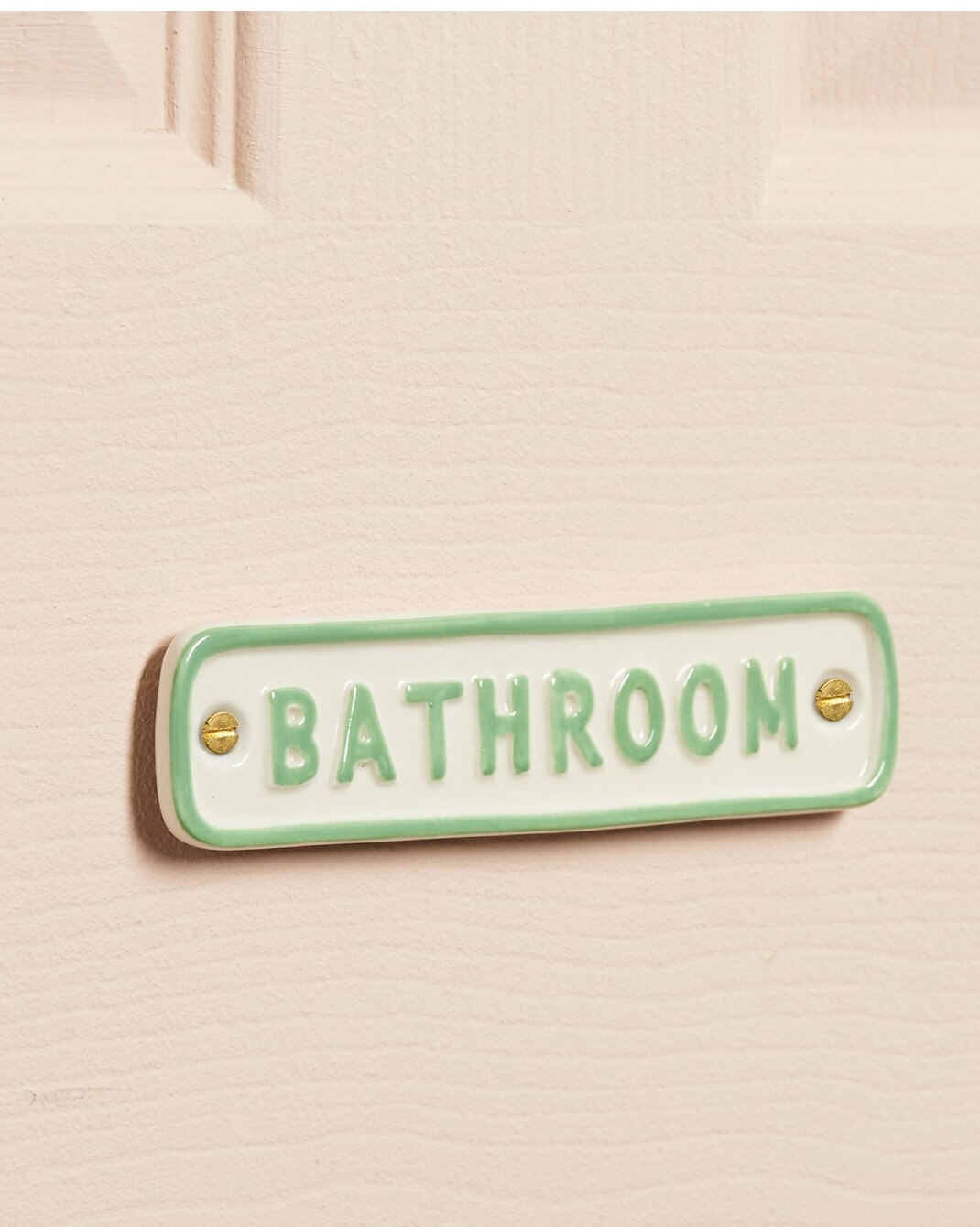 A selection of ceramic bathroom signs 