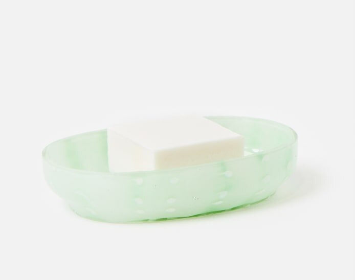 Green glass bathroom accessories 