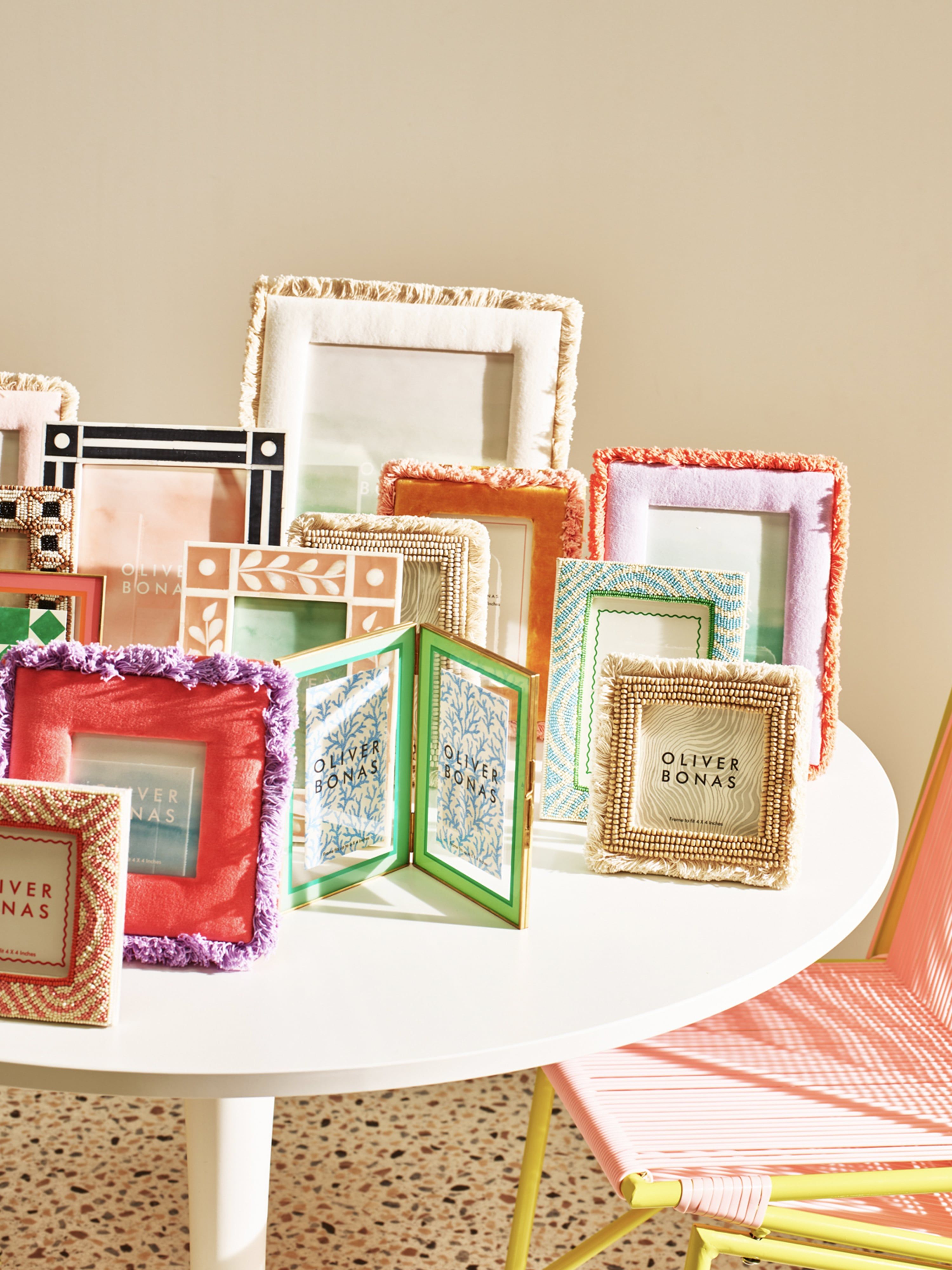 Collection of photo frames on a white round table