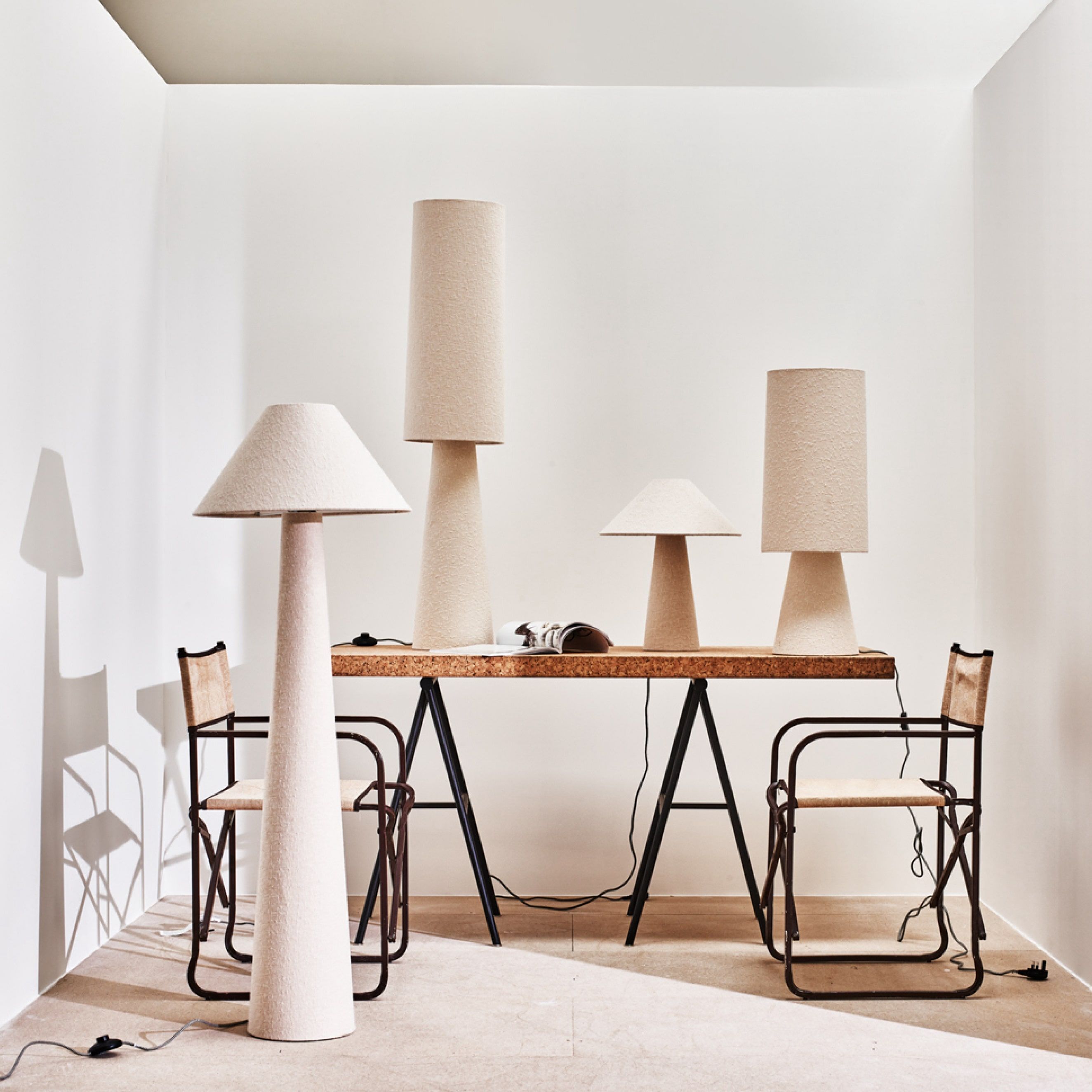 White boucle floor and desk lights on a wooden table 