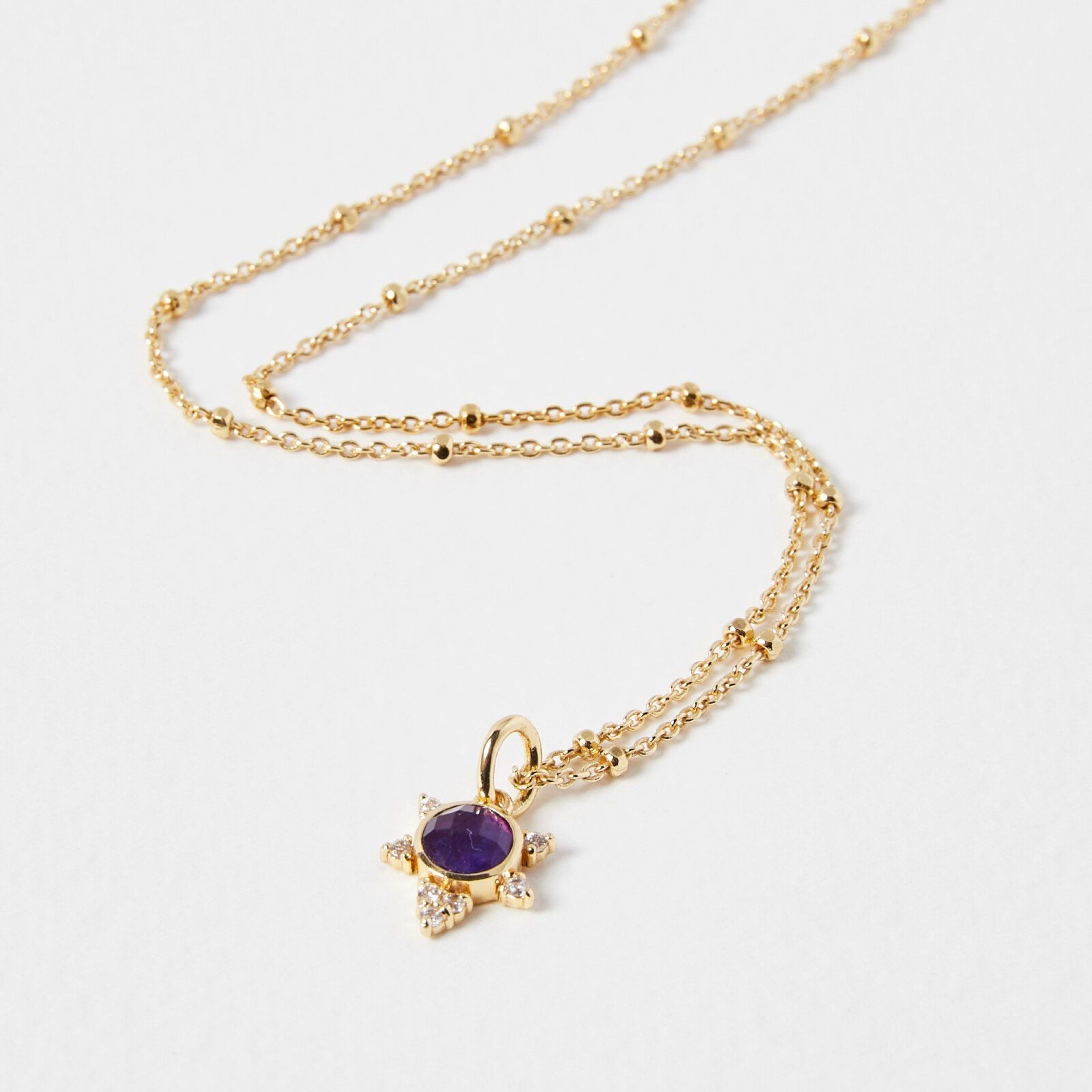 Gold plate ball chain necklace with a Lavendar quartz charm 