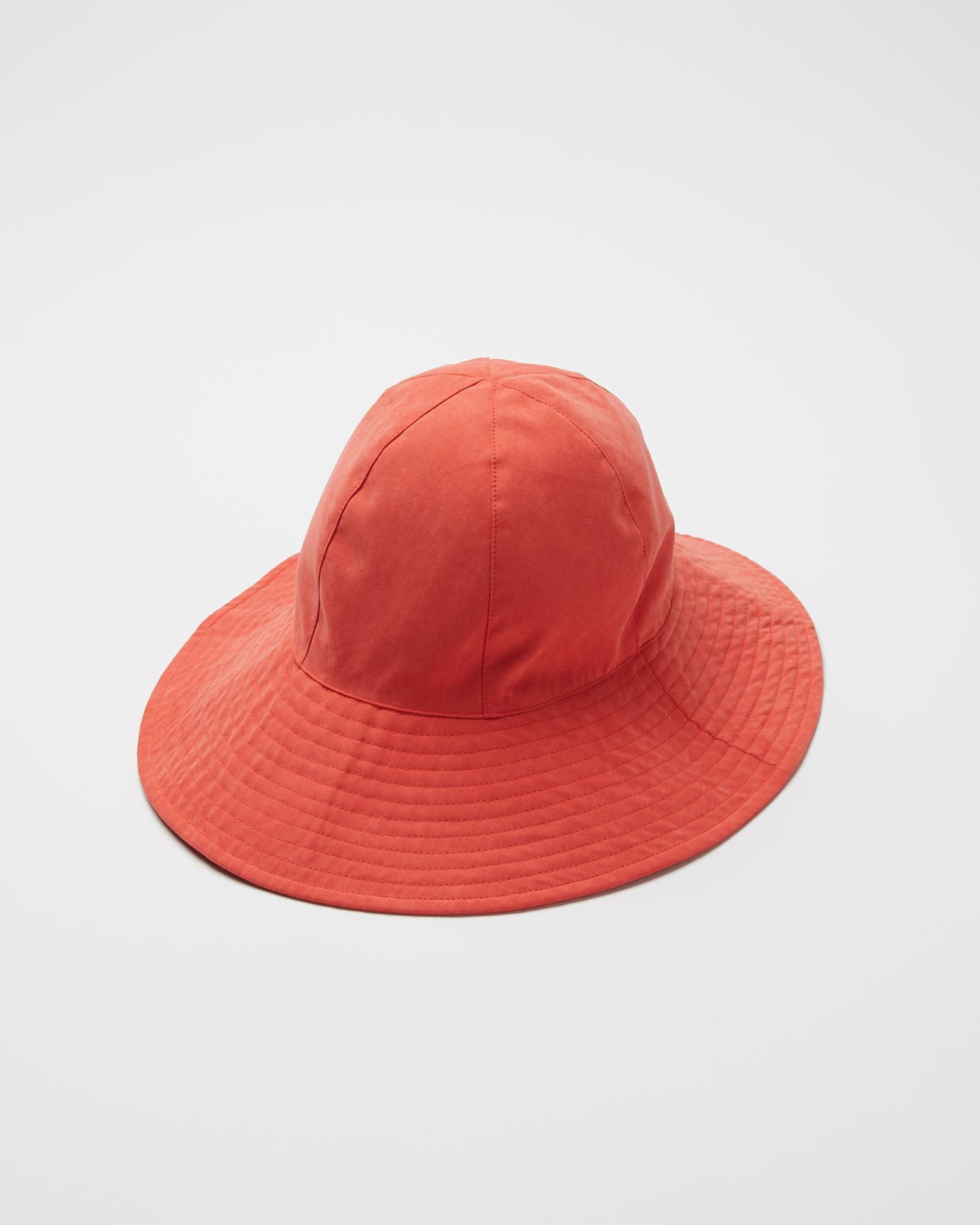 orange floppy sun hat