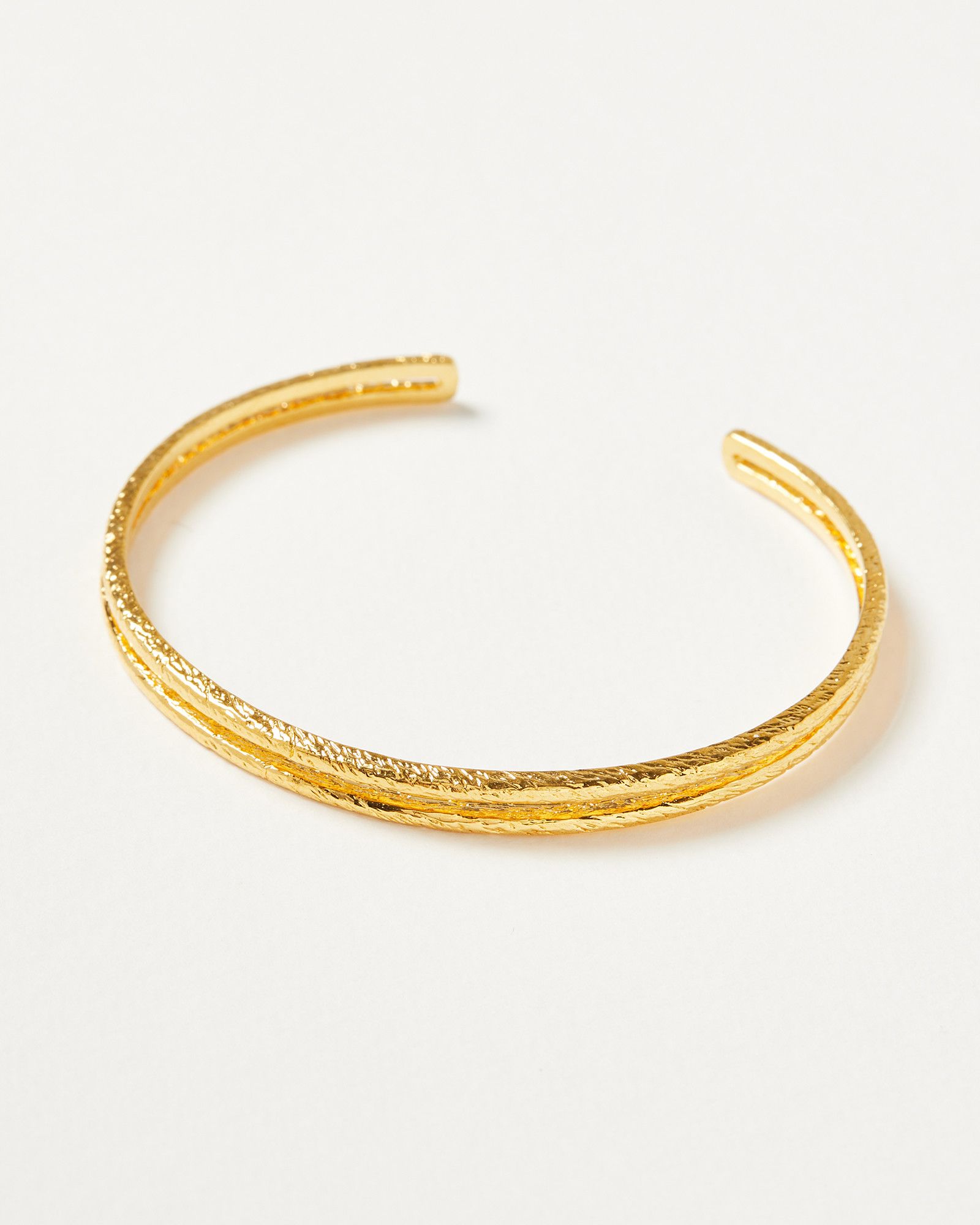 Comino Textured Lines Gold Plated Cuff Bangle | Oliver Bonas